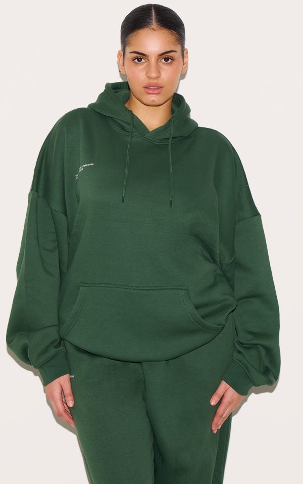 c0045b7b165d2957b890b6319396744d96e758f5_CNG1358_1_prettylittlething_plus_forest_green_est_2012_printed_oversized_hoodie