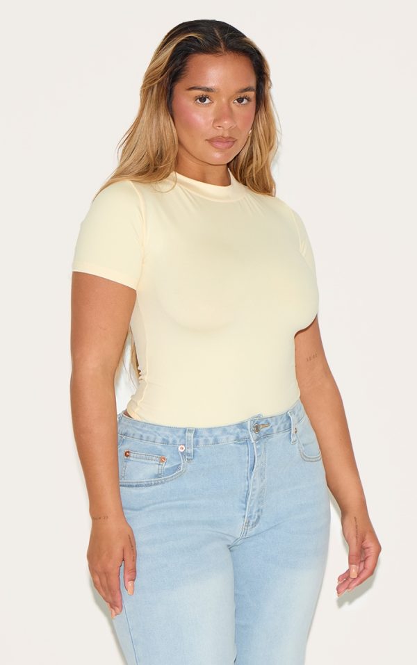 c017e516ca086c112bed8c91642d487805a10603_CNM8309_1_shape_butter_cream_sculpted_short_sleeve_bodysuit