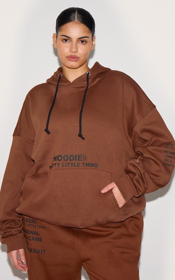c16b75c450b130e74746382b52666e252443f785_CNE5424_1_prettylittlething_plus_chocolate_oversized_fit_slogan_printed_hoodie
