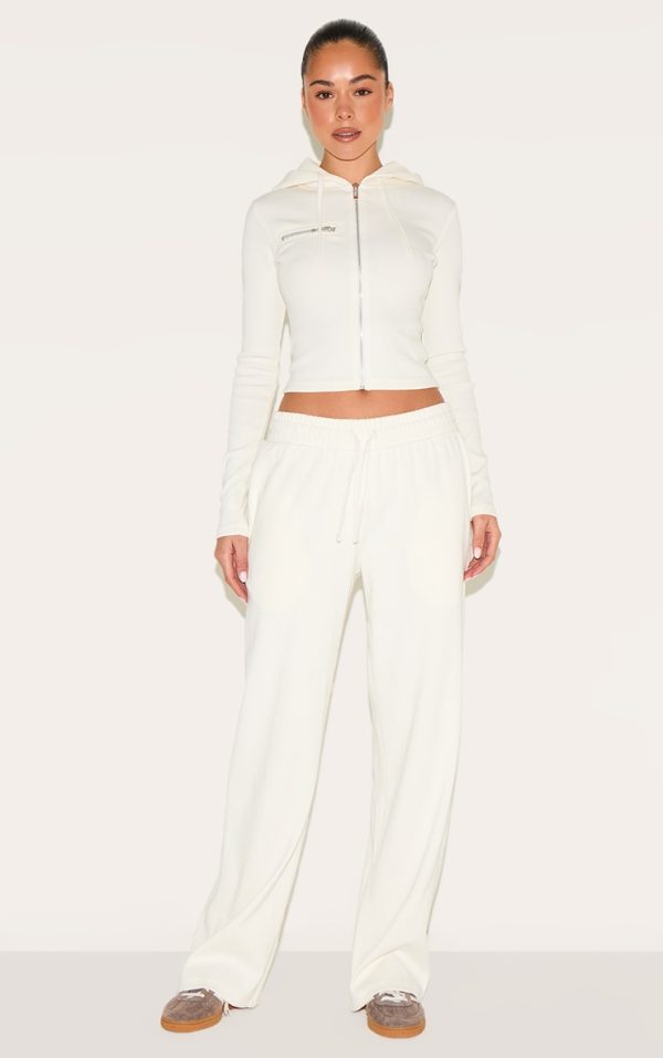 c200c6aecf125525b8fe6595e25309af352589d4_CNM2685_3_cream_zip_up_ribbed_track_top