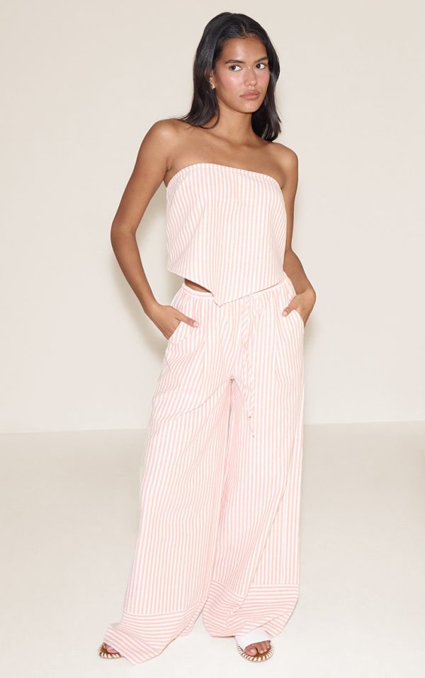 c2a4574a552915780f59e20f5c578c3114f9c3b4_CNM8812_3_orange_pinstriped_bandeau_dipped_hem_top