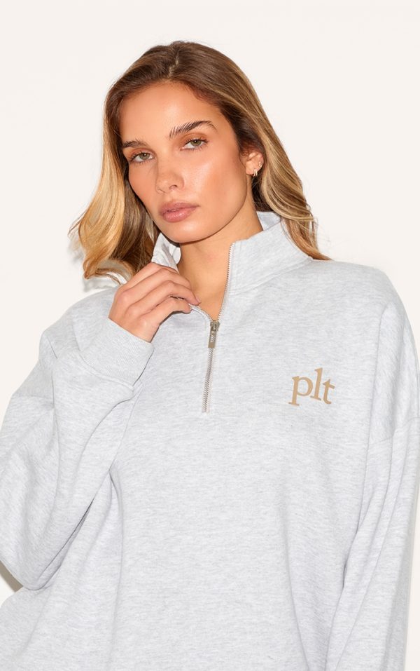c30be1c869ae3f312253337d2c56361f4e4d7697_CNM3807_4_prettylittlething_ash_grey_printed_quarter_zip_sweatshirt