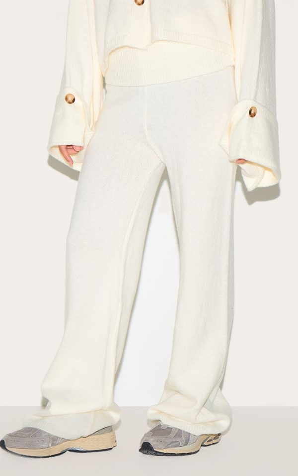 c338714951451904f60592924b2cb1611b585120_CNM1007_2_petite_cream_knitted_fold_over_flare_trousers