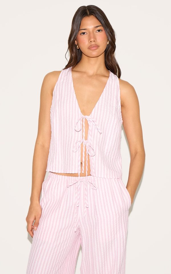 c33f1b427701d9f8481558650486b79d8a66494a_CNM9132_1_pink_striped_sleeveless_tie_front_top
