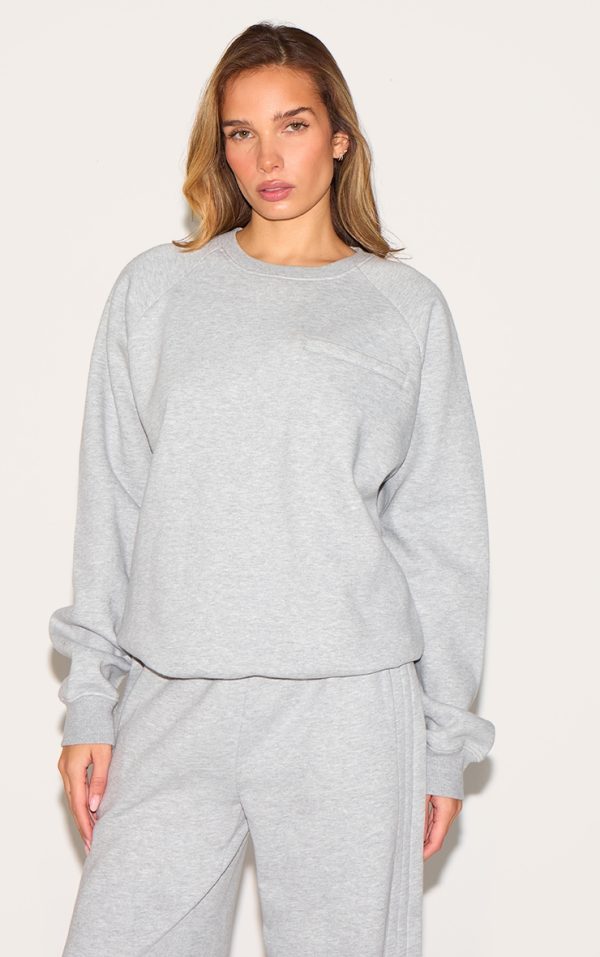 c34bd446d504aa94944069deb4a4601e4e27923e_CNM6503_1_ash_grey_oversized_pocket_detail_sweatshirt