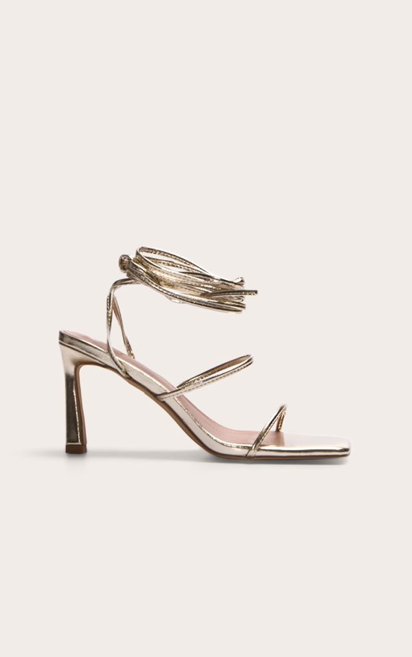 c3a9b67eb1ad2cbf81c0ec9cabae47f25456a534_CNL7030_1_gold_pu_square_toe_strappy_lace_up_mid_stiletto_heeled_sandals