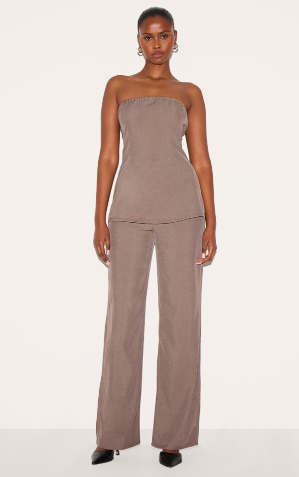 c43875f3bb711d5180e45db609582da87128cabf_CNL9275_1_taupe_woven_tailored_longline_bandeau_flared_jumpsuit-1