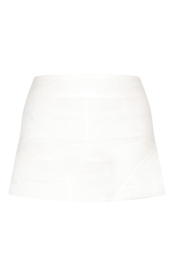 c4c4fdd8b2d6075c37b399903e1e35f0208afa1d_CNM1810_6_white_boucle_low_rise_belted_pleated_mini_skirt