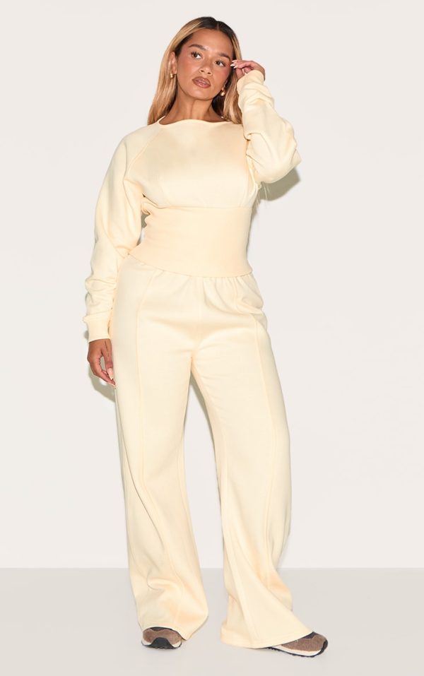 c555c14eaeaacb0f2e3bffe9538d4849357d3ca8_CNN0817_3_shape_lemon_boat_neck_cinched_waist_sweatshirt