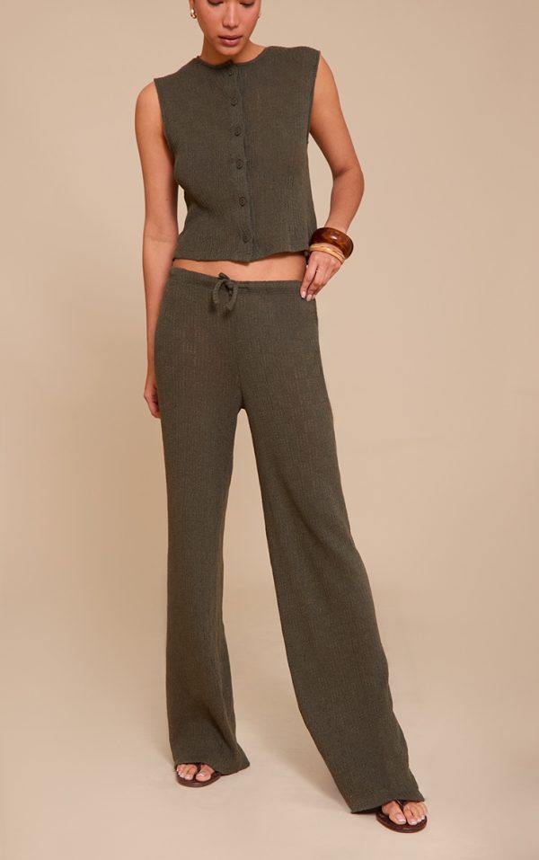 c62a4dffc921fedbfdea19eabd258dfb6ea8ac8c_CNM8931_1_khaki_mid_rise_textured_wide_leg_trousers