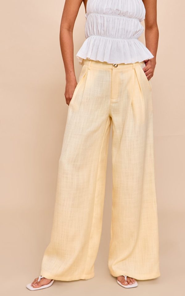 c643ce7c66bcf63353c7eb005d3b47c25d3a84bb_CNM7337_1_butter_cream_tailored_tweed_wide_leg_trousers