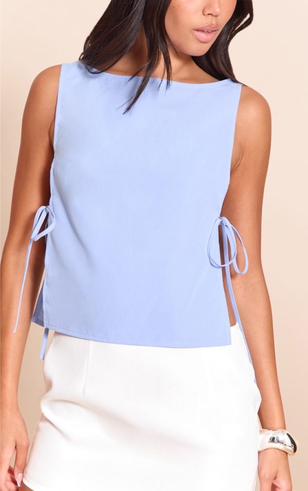 c6c2e74149fa0004db3ebf02acf570d25e8b5151_CNN0320_4_sky_blue_woven_open_tie_side_long_top