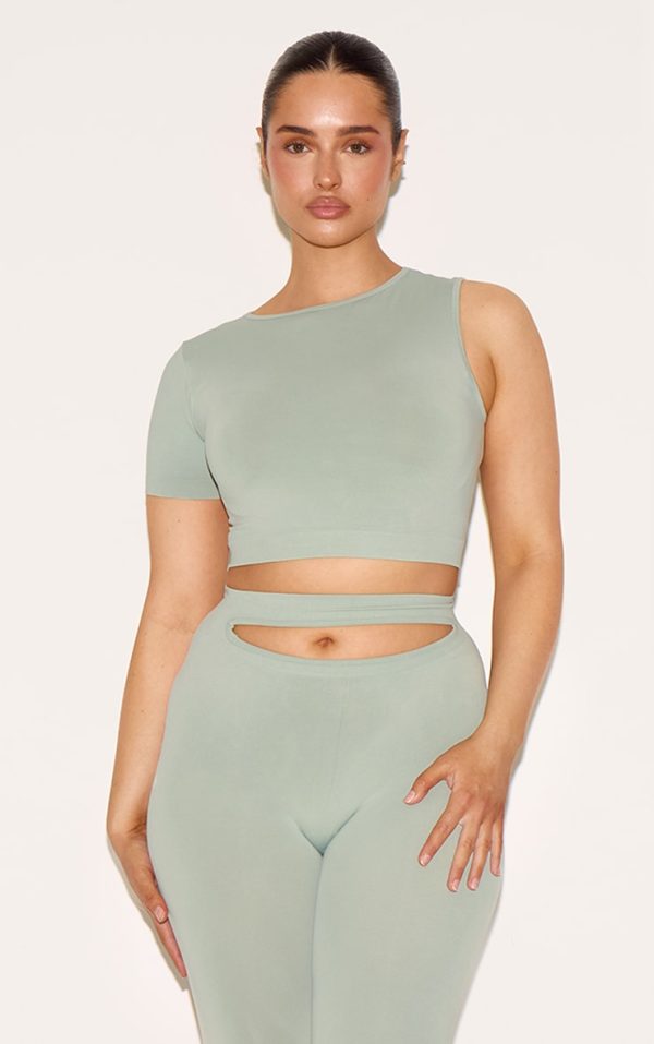 c6e260e42f2553fb9fb11bebd6cc6e0b1a630175_CNJ3366_1_shape_sage_green_soft_seamless_one_sleeve_crop_top