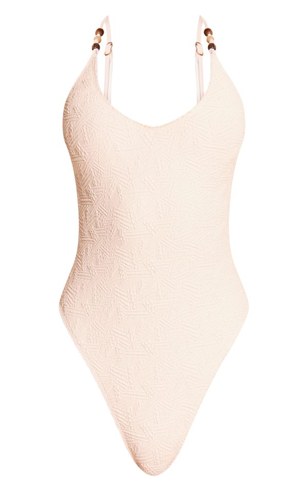 c75e30a078711e6caf6620c415d0d7dc5a79b0b9_CNM6701_5_white_textured_bead_trim_plunge_swimsuit