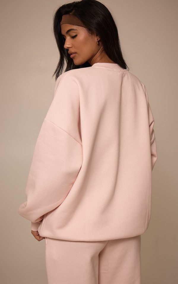 c7d91fc2bf287f4340f204addd8dfab7b60880e1_CNM8142_2_baby_pink_oversized_sweat_tracksuit_set