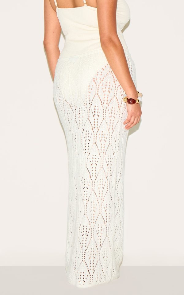 c7e2b69a0952fcf5d5bf963ceff7e1919fc87b86_CNM6514_3_plus_cream_crochet_maxi_knot_detail_beach_skirt