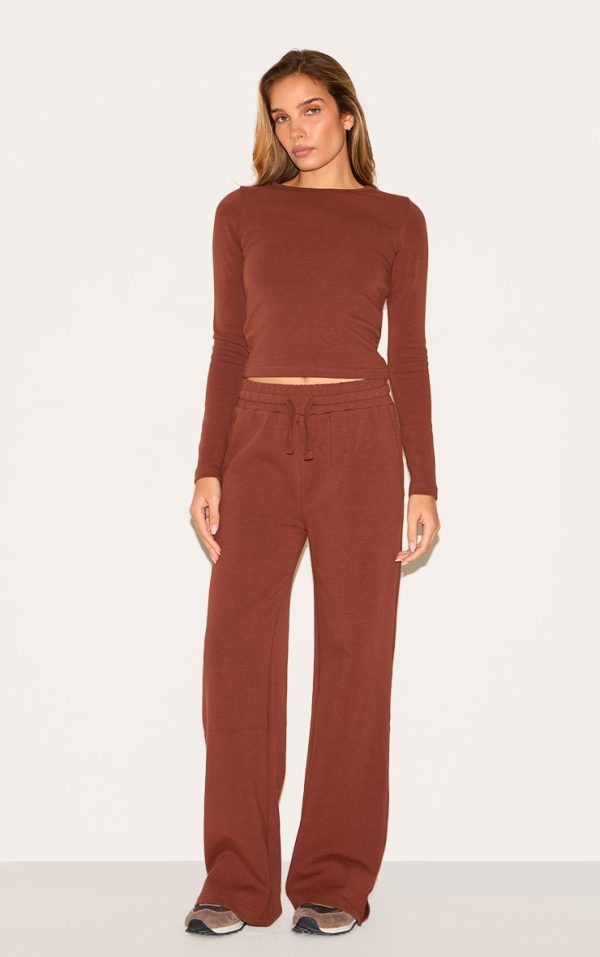 c8e9690c5997b1956c746dcf7e6684f33a94cd76_CNL8036_3_chocolate_interlock_long_sleeve_top-1