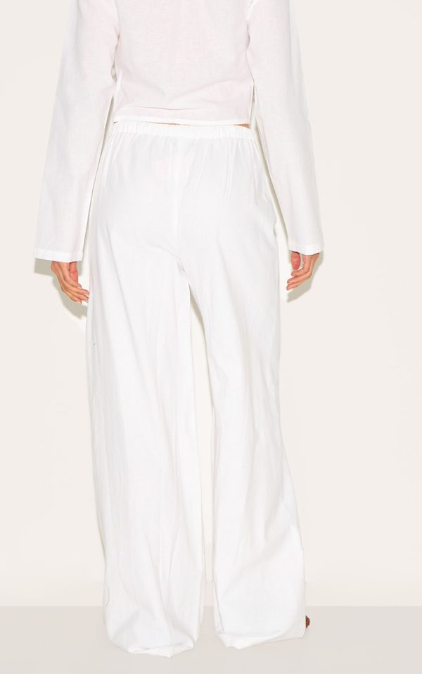c8fe1a42ed0ed2be61bb57439bfdb5cbc1b75dbb_CNM6109_3_white_wide_leg_drawstring_trousers