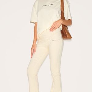 PRETTYLITTLETHING Beige Printed Flared Trousers