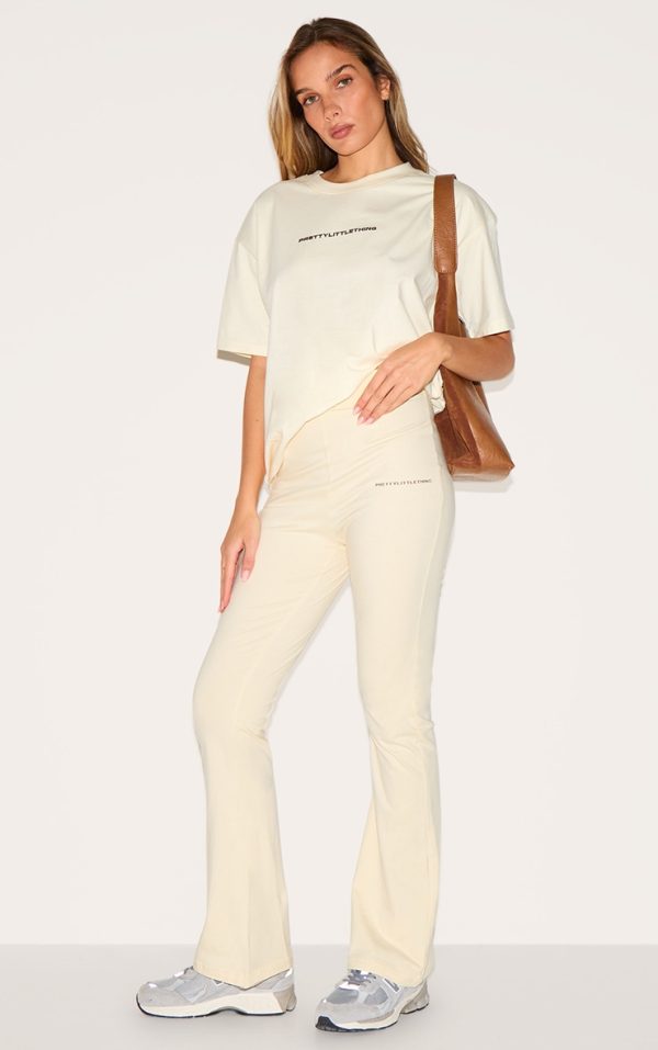 c9d5639c827c482bee2e08cd851f82be65d31f81_CNI8523_1_prettylittlething_beige_printed_flared_trousers
