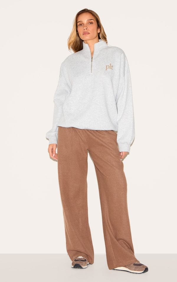 c9fa329a95d3a3ab21fd7630fc8422b820e3b58d_CNM3807_3_prettylittlething_ash_grey_printed_quarter_zip_sweatshirt