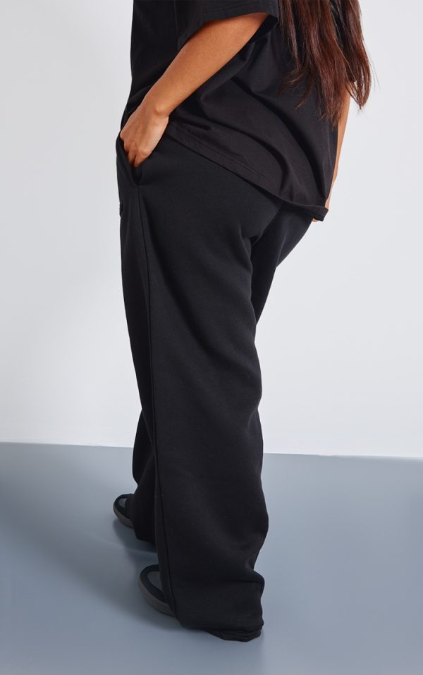 ca1d2c0af55b6076a27bba5d62a6de6f6ae52de5_CNJ6915_3_petite_black_embossed_wide_leg_jogger