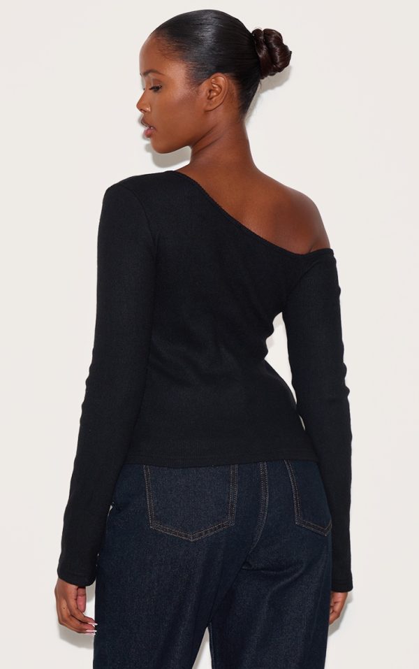 cac8f481fb51e14efde1bc16b9ee61df5195241a_CNL8764_2_black_rib_button_detail_asymmetric_long_sleeve_top