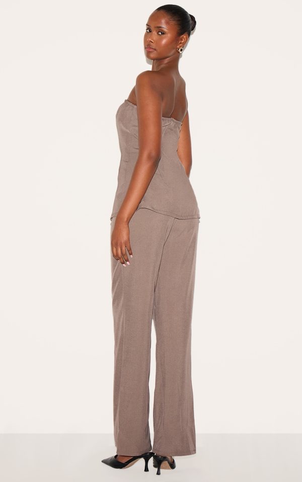 cb7f288eeaa6c5f2491118ef628af2f53fc30780_CNL9275_2_taupe_woven_tailored_longline_bandeau_flared_jumpsuit-1