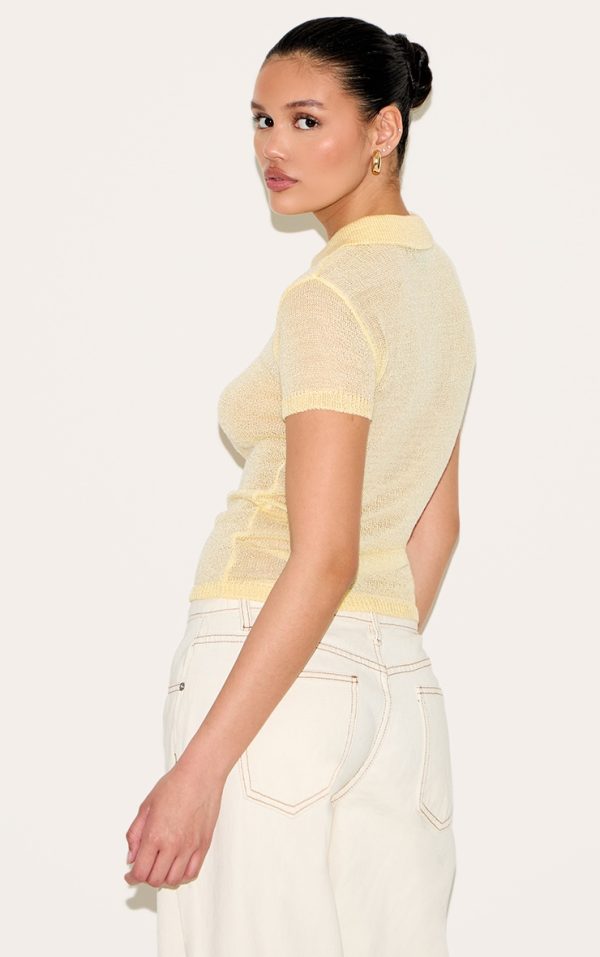 cb862517b2a7f1cc6872d31cad186e4aef3623de_CNM9269_2_yellow_sheer_knit_polo_top