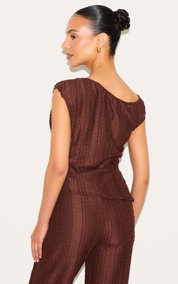 cbeb146d517ecb2757eac5894fe94da8e28a3166_CNN1060_2_petite_chocolate_asymmetric_textured_off_shoulder_top