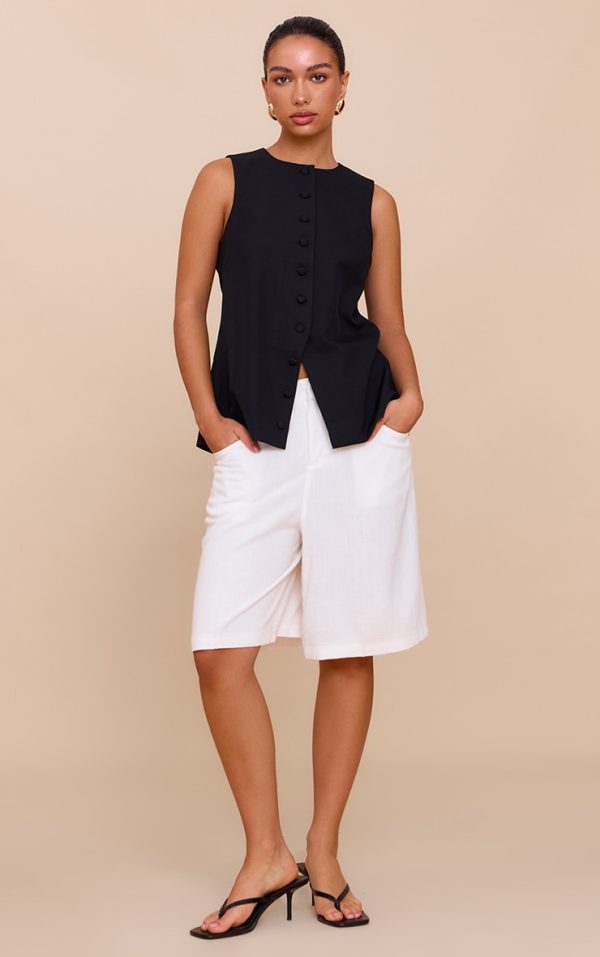 cc3ae8cd6f2d2346e32414434a31419e04a5c965_CNN0272_3_black_woven_button_down_longline_waistcoat