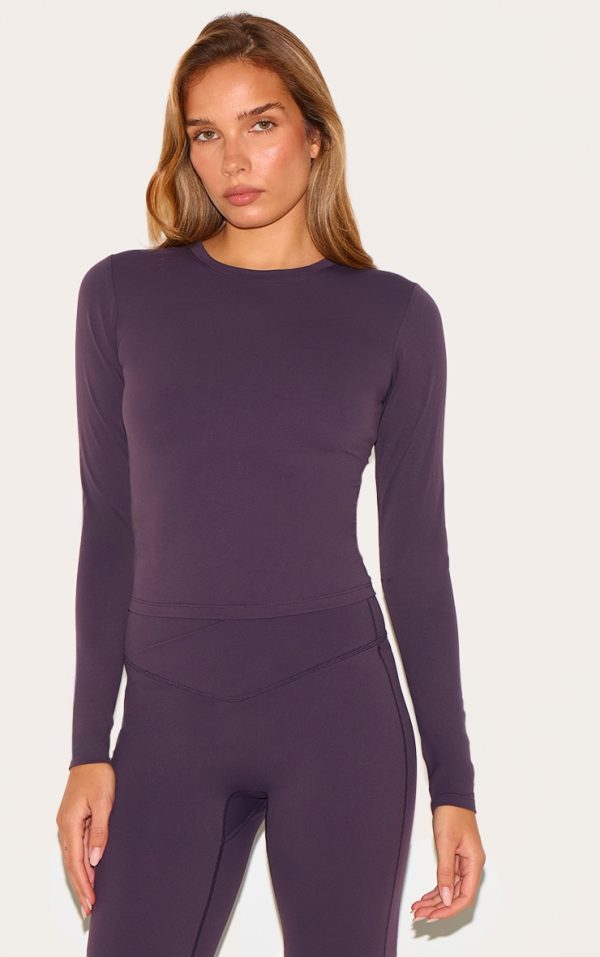 cc476d56754315a0ac0701ae507f08ea2343ad77_CNL7880_1_dark_plum_sculpt_long_sleeve_crop_gym_top
