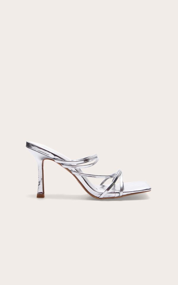 cc82f0dfe5b2d4561944ba7a36798a5626cdfeef_CNE7948_1_silver_pu_square_toe_multi_cross_strap_detail_mid_heeled_mules