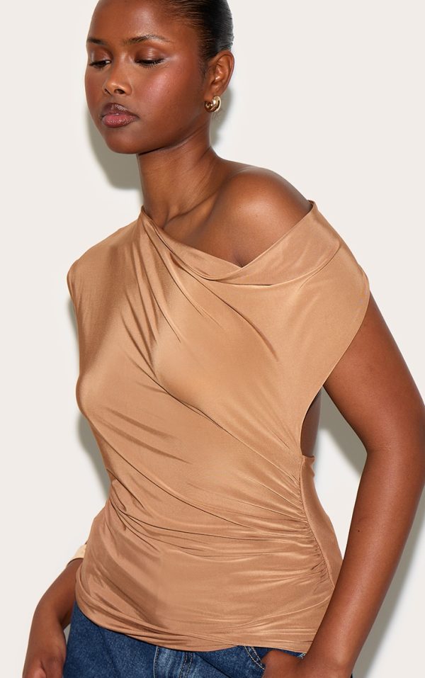cddc35d19cda02deaafd4f280b78cafe3a9e94a1_CNN0757_1_tan_double_layer_slinky_backless_asymmetric_long_top
