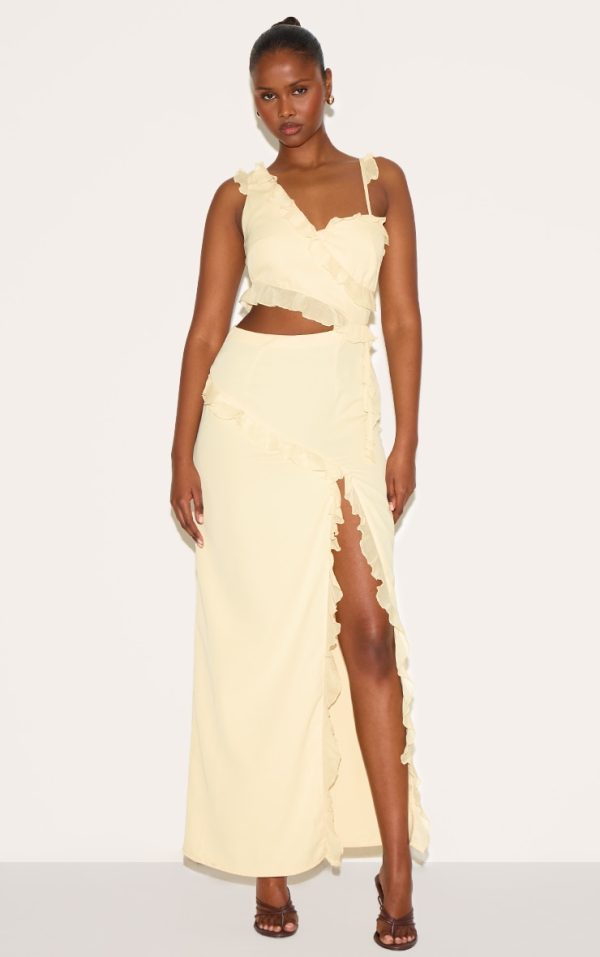 ce5c90937c76aaebb54560215eeec89f1e598e9e_CNM0891_1_butter_cream_chiffon_frill_cut_out_maxi_dress