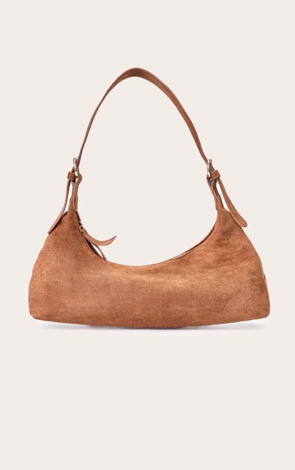 ceccc79f55da6241f4dd794c895cca0a495d3124_CNM3902_1_tan_suede_elongated_curved_shoulder_bag