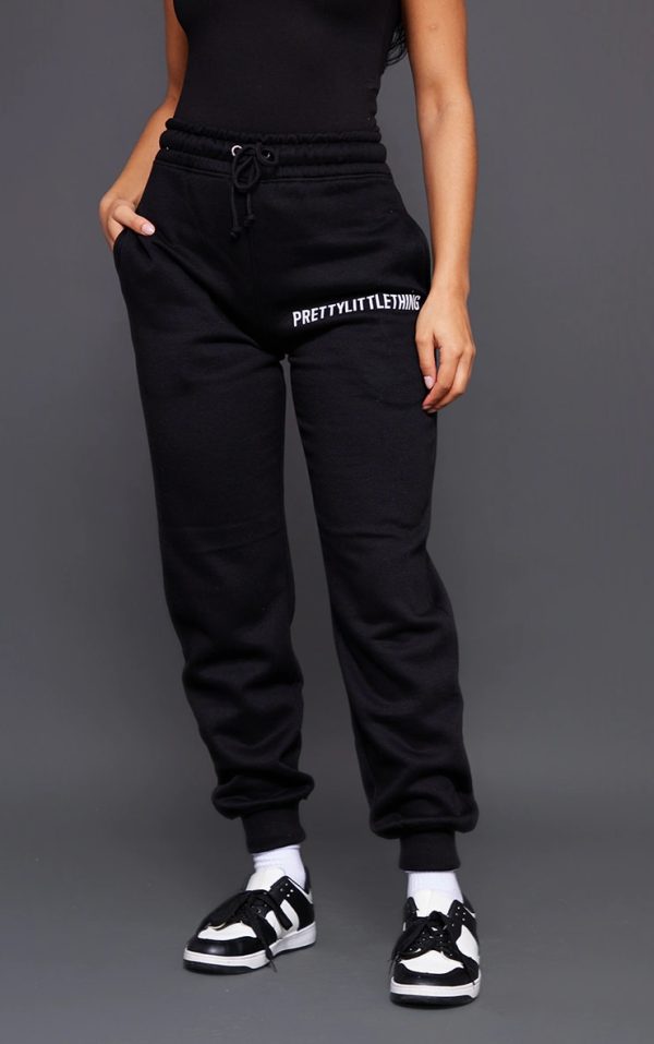 cef8d3a96e8c9c426be36ec0f091c9d39372b0aa_CNF2360_2_prettylittlething_black_logo_high_waisted_cuffed_joggers