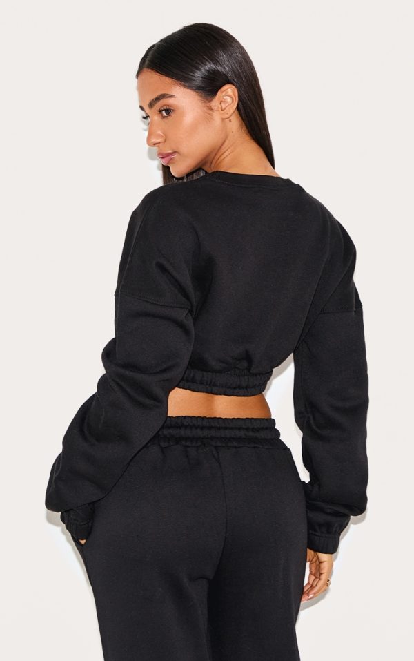 cf11fb9dd5bfdf4dd6a40835ee6c3c0574a2ddba_CNG6141_2_petite_black_crop_elasticated_sweat_top-1