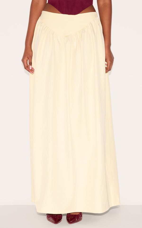 cfa9704161bcd3a13d0230d651048246cc5b81ed_CNL9321_2_almond_dipped_waist_structured_a_line_maxi_skirt-1