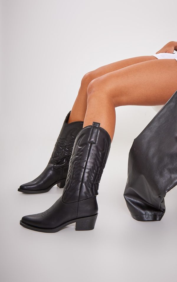 cfb91a4933ee9ccc27b08c043689d35de3e43817_CNG2927_1_black_faux_leather_point_toe_knee_high_western_boots