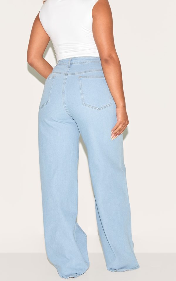 d0ab13139f97d754c1b6075b20c26eedcd7df716_CNM2072_3_shape_light_blue_stretch_denim_highwaisted_adjustable_button_wide_leg_jeans