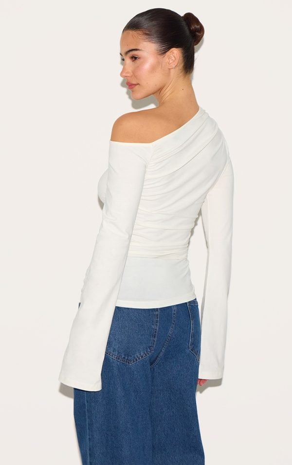 d0b750691c616d33e7c675aed784bcbbb988bb01_CNM3765_2_cream_asymmetric_ruched_flared_sleeve_long_top