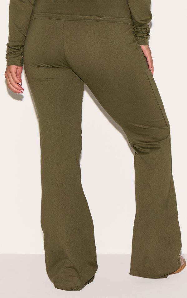 d1c63ad595ffa807a0d7e509c65ccad035dce815_CNH5589_3_prettylittlething_plus_khaki_jersey_skinny_flared_trousers