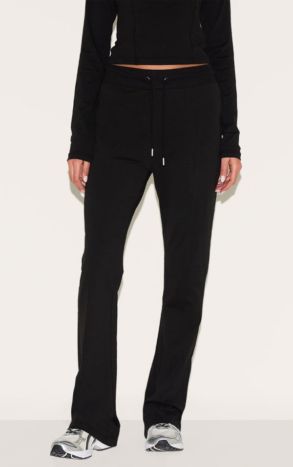 d294a217a5143c55b4eebcecc59bfdd19d9f016f_CNM2916_2_black_cotton_seam_detail_mid_rise_skinny_flares