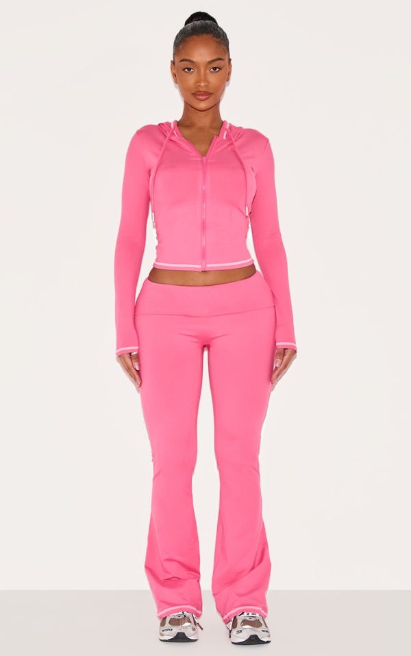 d447413ea54d64aa75ead195821543e0780447f6_CNJ9555_1_shape_hot_pink_sculpted_contrast_stitch_foldover_waist_flare_trousers-1