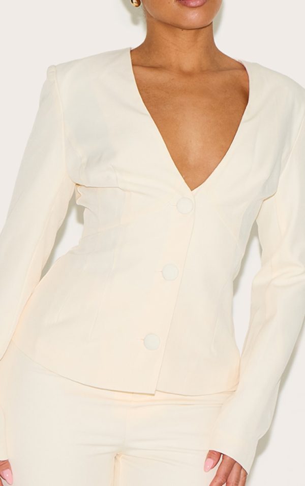 d54b0d3a61dd856620266639f4ede8d8b2e2308b_CNM0813_4_shape_vanilla_plunge_front_cinched_waist_blazer