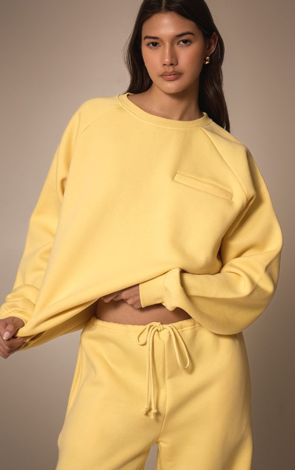 d614f8bc6b30a6b1d134cab370fa319141967aad_CNM6502_1_lemon_oversized_pocket_detail_sweatshirt