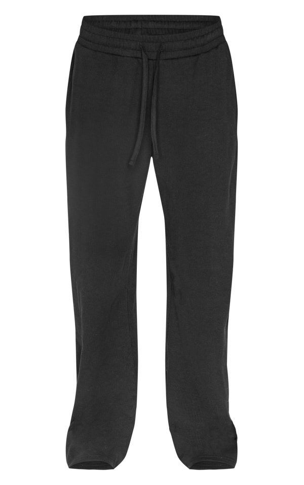 d64595b87a6a2260de6b14ebc83512ecdf769249_CNL4848_5_black_ribbed_low_rise_wide_leg_trousers