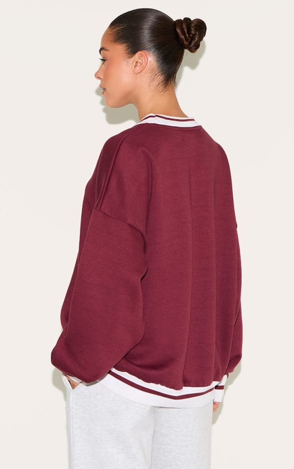 d6b5448b2f5012476ff4f3ddf5229399810778fd_CNL4111_2_burgundy_striped_ribbed_hem_oversized_sweatshirt-1