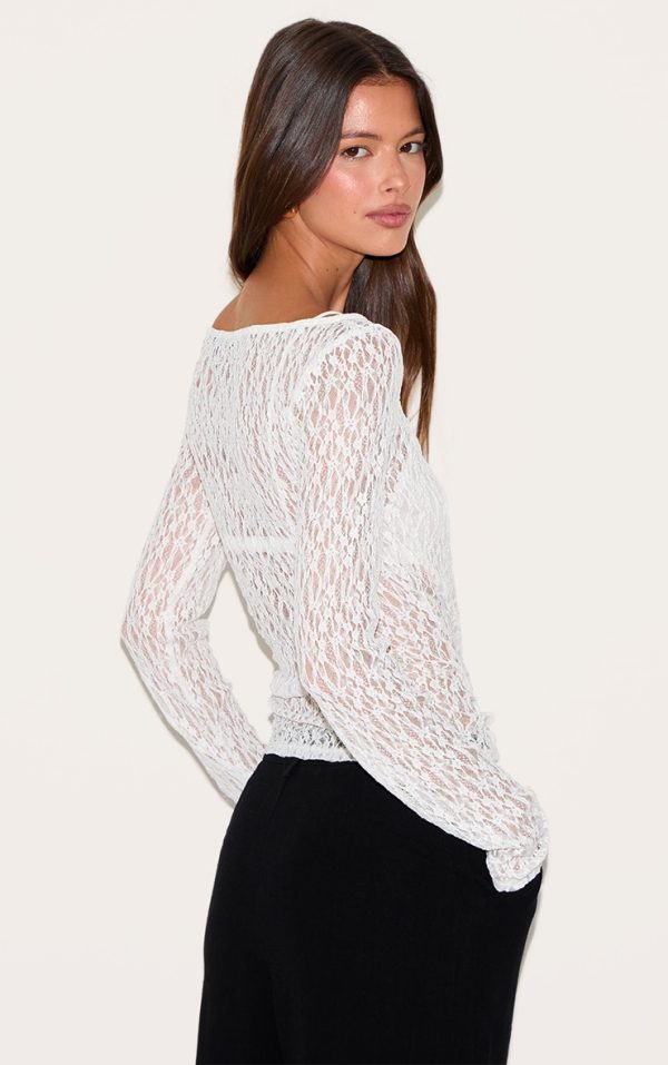 d8485dc7425c75c6fbb349c6ee7911bb1d7b8516_CNN0193_2_white_textured_sheer_lace_boat_neck_cap_sleeve_top